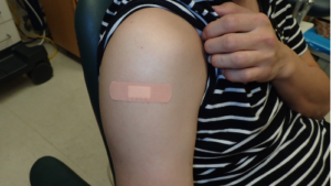 Place a bandage over the injection site.